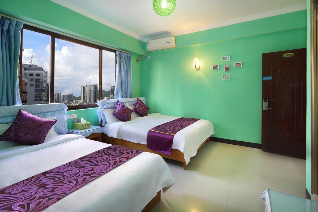 Апартаменты Hantang Holiday House Санья Экстерьер фото