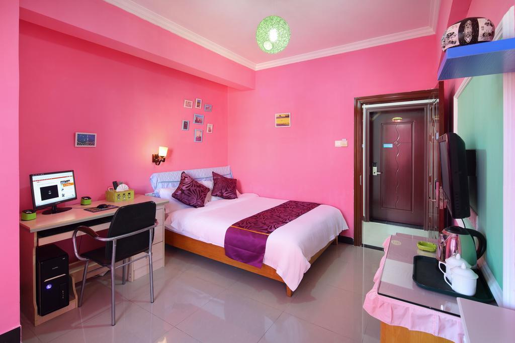 Апартаменты Hantang Holiday House Санья Экстерьер фото