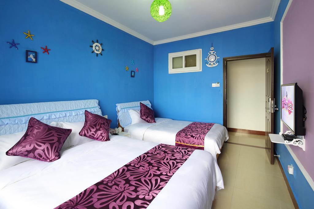 Апартаменты Hantang Holiday House Санья Экстерьер фото